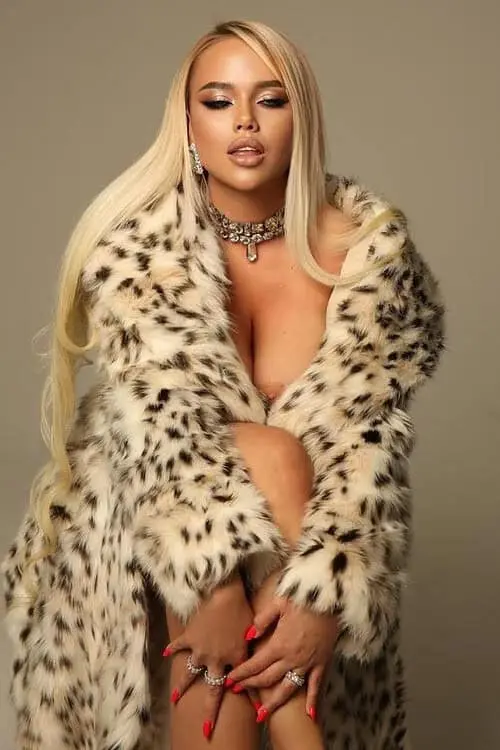 Woman in leopard print coat with jewellery