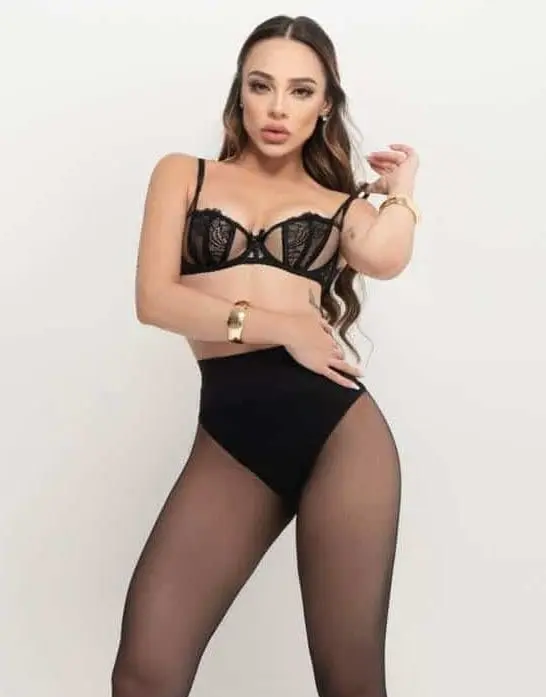 Woman in black lingerie and pantyhose