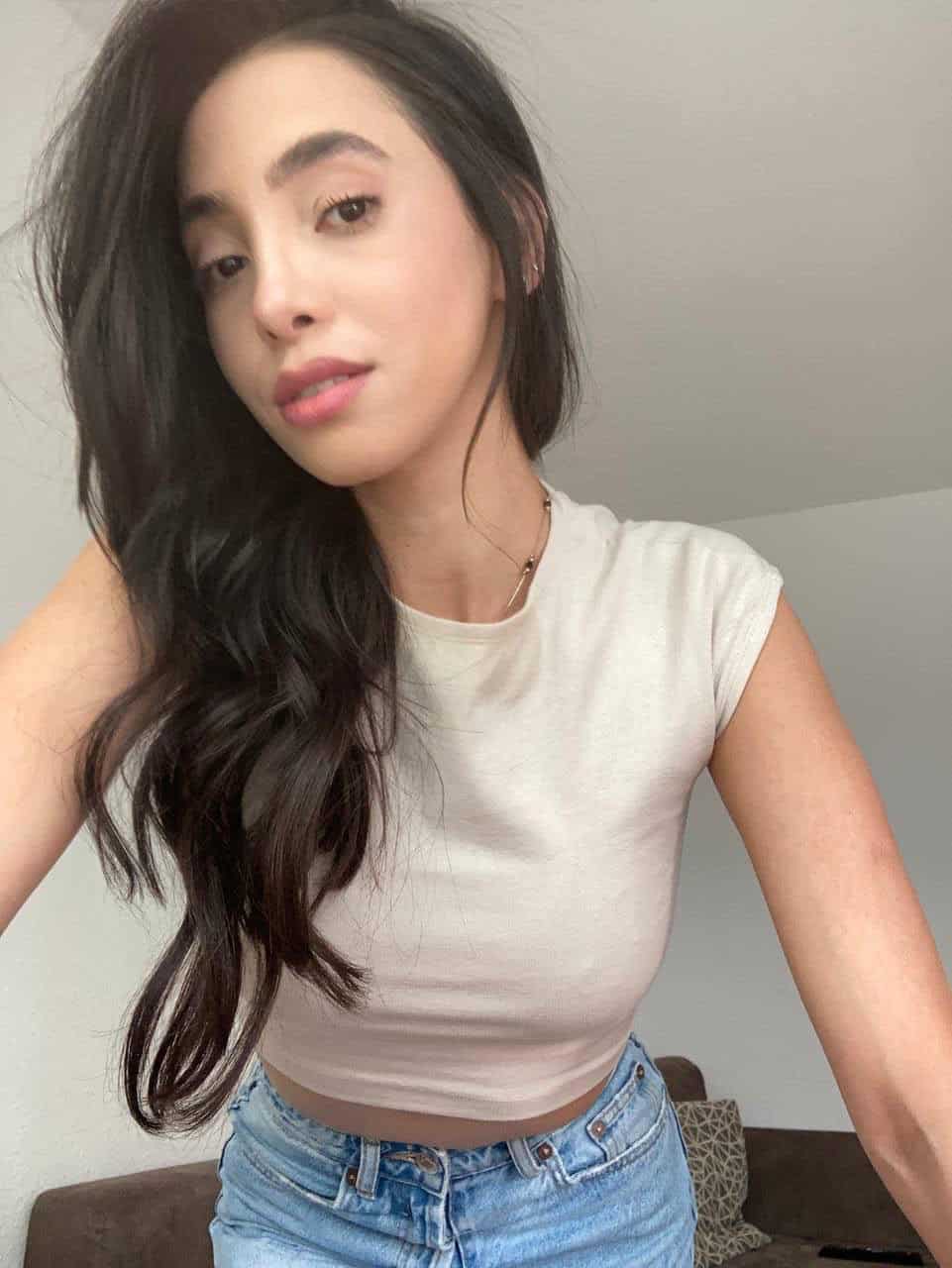 Young woman with long hair indoors.