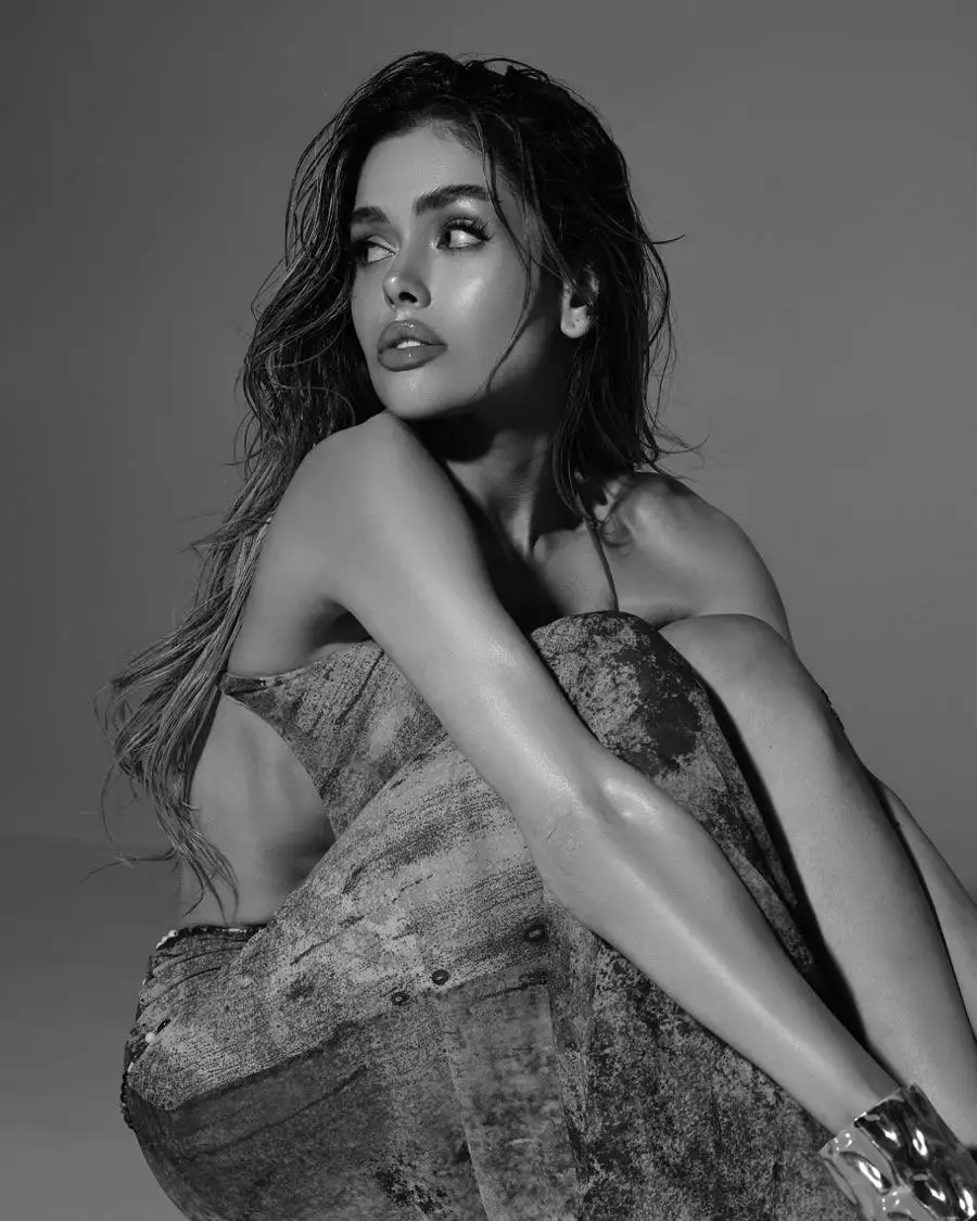 Dramatic black and white portrait of a woman looking away